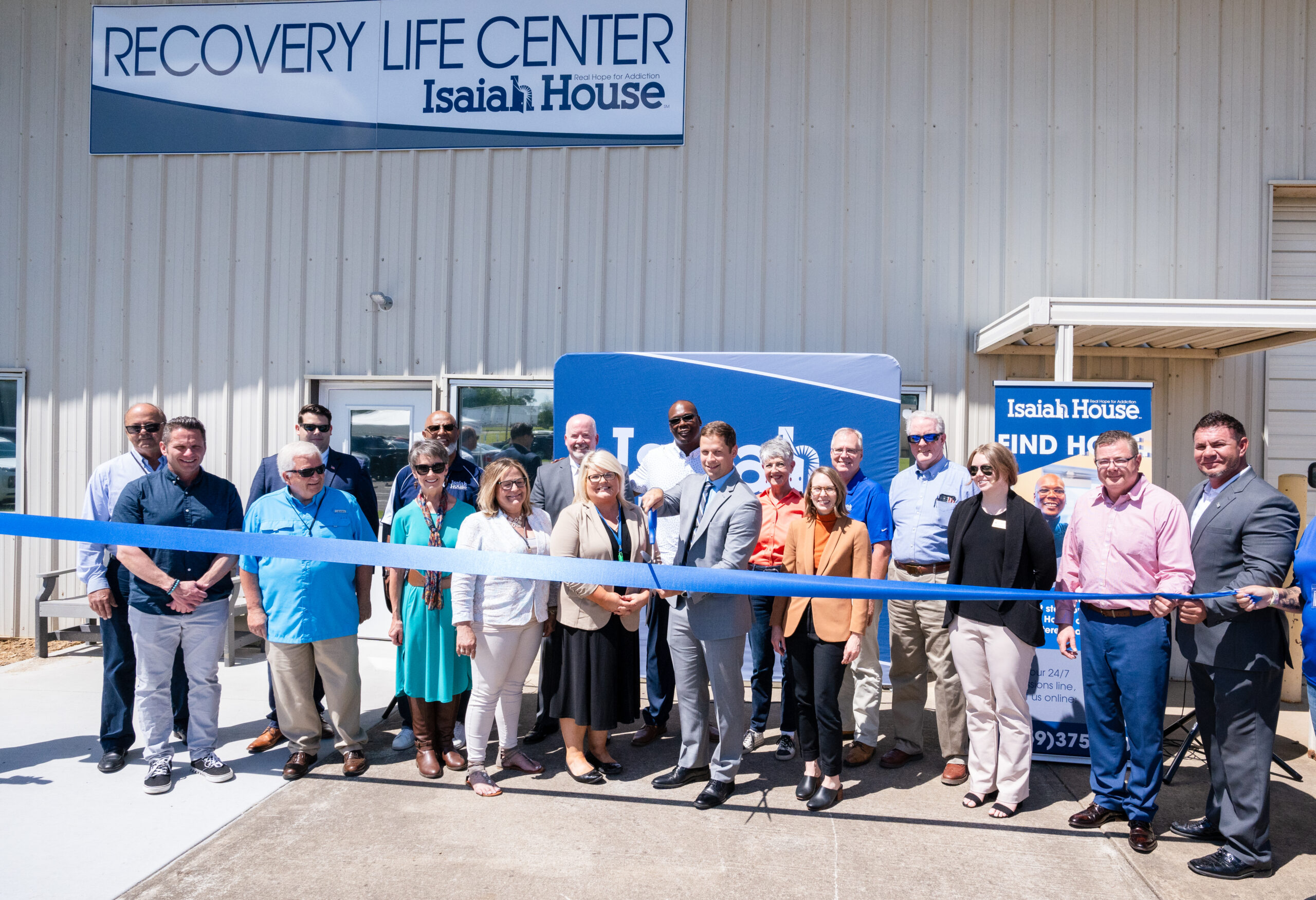 Isiah House leaders and community partners cut the ribbon on the Recovery Life Center in Harrodsburg. 