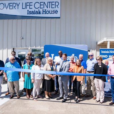 Isaiah House leaders and community partners cut the ribbon on the Recovery Life Center in Harrodsburg.